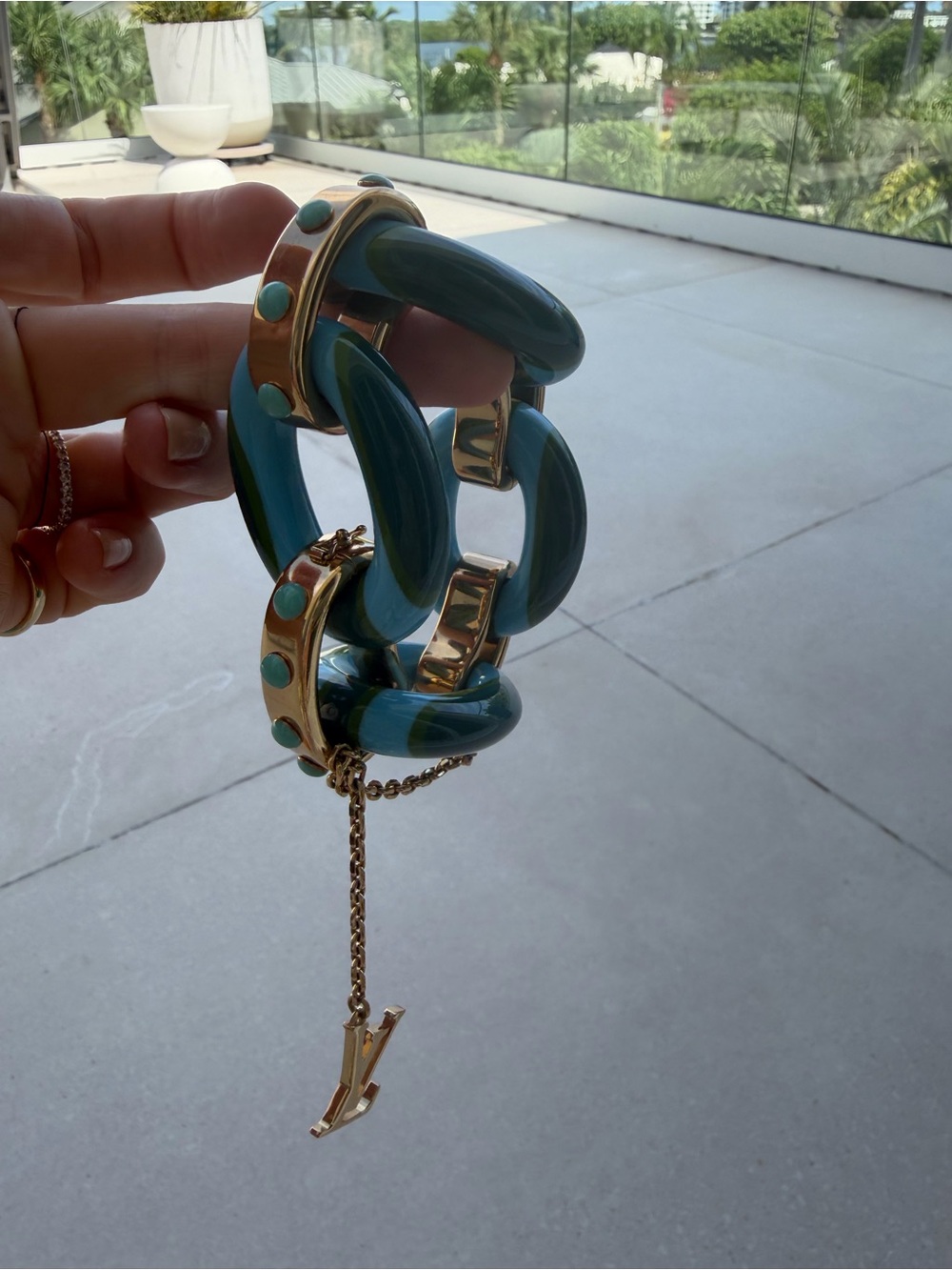 Louis Vuitton Blue and Turquoise Striped Resin Bracelet with Gold LV Charm - Picture 12 of 13